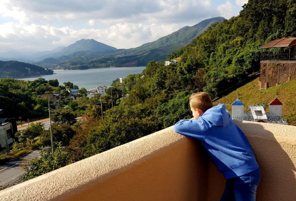 Our Son Enjoying the River Views from Petite France near Seoul